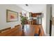 Charming kitchen featuring stainless steel appliances, wood cabinets, and a dining room area at 234 Rutledge Ave # D, Charleston, SC 29403