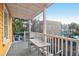 Spacious porch with furniture and neighborhood view at 234 Rutledge Ave # D, Charleston, SC 29403