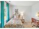 Bright bedroom features a patterned bedspread, serene artwork, and streams natural light at 243 Watersglen Dr, Summerville, SC 29486
