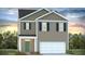 Charming two-story home with a two-car garage, covered entry, and neutral toned siding at 243 Watersglen Dr, Summerville, SC 29486