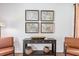 Living room featuring a console table, chairs, decorative wall art, and hardwood flooring at 243 Watersglen Dr, Summerville, SC 29486