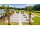 Community area featuring a bocce ball court, picnic tables, and walking paths near lush landscaping at 254 Watersglen Dr, Summerville, SC 29486