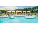 Sparkling community pool with covered seating areas and comfortable lounge chairs for residents to enjoy at 254 Watersglen Dr, Summerville, SC 29486