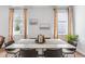 Dining area featuring modern table with seating, natural light, and modern decor at 265 Watersglen Dr, Summerville, SC 29486