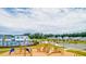 Community playground with climbing structures, swings, and a slide, set near the pool and parking area at 271 Watersglen Dr, Summerville, SC 29486