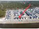Aerial shot showing the property's location within a residential neighborhood near a pond at 332 Clearpath Dr, Summerville, SC 29486