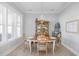 Charming dining room with natural light, chandelier, and views of backyard at 332 Clearpath Dr, Summerville, SC 29486
