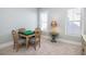Cozy game room featuring a game table, lamp, and natural light from the windows at 332 Clearpath Dr, Summerville, SC 29486