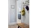 Hallway with wood flooring, leading to kitchen with stainless steel dishwasher at 332 Clearpath Dr, Summerville, SC 29486