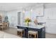 Modern kitchen with a large island, white cabinets, and stainless steel appliances at 332 Clearpath Dr, Summerville, SC 29486