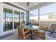 Inviting screened porch with seating, perfect for outdoor relaxation at 332 Clearpath Dr, Summerville, SC 29486