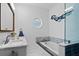 Bright bathroom with white countertops, a soaking tub, and unique decorative fish wall art at 3348 River Landing Rd, Johns Island, SC 29455