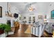 Bright living area with fireplace, vaulted ceilings, and stylish furnishings at 3348 River Landing Rd, Johns Island, SC 29455