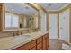 Luxurious bathroom with double vanity, a large mirror, and a glass-enclosed shower at 3632 Locklear Ln, Mount Pleasant, SC 29466