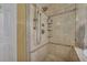 Walk in shower includes tile surround, glass door, rain shower head and convenient corner shelves at 3632 Locklear Ln, Mount Pleasant, SC 29466