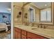 Elegant bathroom with a double sink vanity, stylish mirrors, and modern fixtures at 3632 Locklear Ln, Mount Pleasant, SC 29466