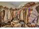 Walk-in closet with wire shelving and a variety of clothing and accessories at 3632 Locklear Ln, Mount Pleasant, SC 29466