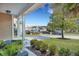 Inviting front porch with seating and view of the well-manicured front yard at 3632 Locklear Ln, Mount Pleasant, SC 29466
