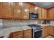 Well-equipped kitchen featuring stainless steel appliances, granite countertops, and a gas range at 3632 Locklear Ln, Mount Pleasant, SC 29466