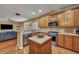 Open kitchen featuring stainless steel appliances, granite countertops, and hardwood floors at 3632 Locklear Ln, Mount Pleasant, SC 29466