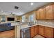 Modern kitchen featuring granite countertops, stainless steel appliances, and a breakfast bar at 3632 Locklear Ln, Mount Pleasant, SC 29466