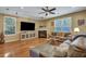 Comfortable living room featuring hardwood floors, fireplace, and recessed lighting at 3632 Locklear Ln, Mount Pleasant, SC 29466
