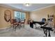 Functional office space offering a large window for natural light and a versatile workspace at 3632 Locklear Ln, Mount Pleasant, SC 29466