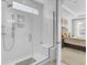 New bathroom featuring glass shower, white tile, and built-in shower seat at 376 Tupelo Lake Dr, Summerville, SC 29486