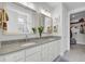 Elegant bathroom with double sinks, granite counters, and a large walk-in shower at 376 Tupelo Lake Dr, Summerville, SC 29486
