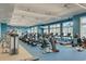 Well-equipped fitness center with treadmills, elliptical machines and wall-mounted TVs at 376 Tupelo Lake Dr, Summerville, SC 29486