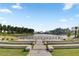 Scenic view of the community lake featuring terraced seating and a serene waterfront at 376 Tupelo Lake Dr, Summerville, SC 29486