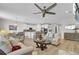 Open-concept living space connecting the kitchen and dining area with plush seating and modern decor at 376 Tupelo Lake Dr, Summerville, SC 29486