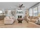 Inviting living room with comfortable seating, fireplace, and a ceiling fan for added comfort at 376 Tupelo Lake Dr, Summerville, SC 29486