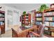 Classic office space with rich wood accents, custom shelving, and ample workspace at 376 Tupelo Lake Dr, Summerville, SC 29486