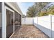 This home features a fenced back yard with brick pavers and access to the screened porch at 5215 Chicory Ln, North Charleston, SC 29420