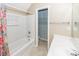 Bathroom with a tub-shower combination and a single sink vanity with a large mirror at 5215 Chicory Ln, North Charleston, SC 29420