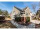 Charming two-story townhome with manicured lawn and established landscaping at 5215 Chicory Ln, North Charleston, SC 29420
