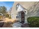 Charming front entryway with a covered porch and a well-maintained garden, offering curb appeal at 5215 Chicory Ln, North Charleston, SC 29420