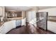 Spacious kitchen with stainless appliances, and granite countertops, that overlooks the dining and living areas at 5215 Chicory Ln, North Charleston, SC 29420