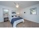 Cozy bedroom with ceiling fan, carpet, and a bed with white and blue linens at 715 Old Golf Rd, Summerville, SC 29483