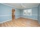Bright bedroom with hardwood floors, a ceiling fan, and ample natural light at 715 Old Golf Rd, Summerville, SC 29483
