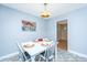 Cozy dining area with a stylish table, four chairs, and plenty of natural light at 715 Old Golf Rd, Summerville, SC 29483