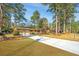 Charming brick home with attached two-car garage, long driveway, and beautiful landscaping at 715 Old Golf Rd, Summerville, SC 29483