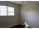 A bright bedroom is naturally lit by a window with wood floors at 7645 Knollwood Dr, North Charleston, SC 29418
