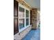 Close up of the side of a brick house featuring white trim around the windows at 7645 Knollwood Dr, North Charleston, SC 29418