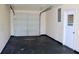 An empty garage has ample space for cars and storage at 7645 Knollwood Dr, North Charleston, SC 29418