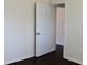 An open doorway provides a glimpse into connecting rooms, enhancing flow at 7645 Knollwood Dr, North Charleston, SC 29418