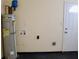 A water heater in the utility room offers efficient home management at 7645 Knollwood Dr, North Charleston, SC 29418