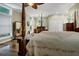 Spacious main bedroom with plenty of natural light from the windows at 8869 Marsh Aire Ln, Edisto Island, SC 29438
