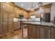 Well-equipped kitchen featuring stainless steel appliances and custom cabinets at 8869 Marsh Aire Ln, Edisto Island, SC 29438